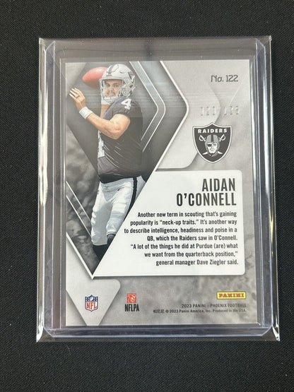 2023 Panini Phoenix - Rookies Purple Seismic #122 Aidan O'Connell /125 Raiders